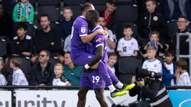 Notts County goalscorer Alassana Jatta celebrates