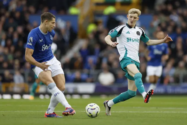 Everton's James Tarkowski in action with Newcastle United's Anthony Gordon