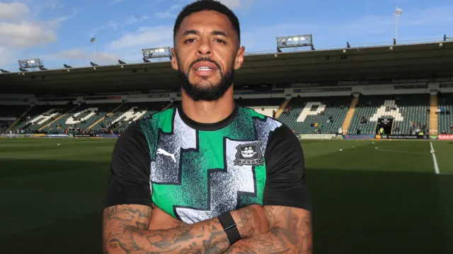 Andre Gray in Plymouth shirt