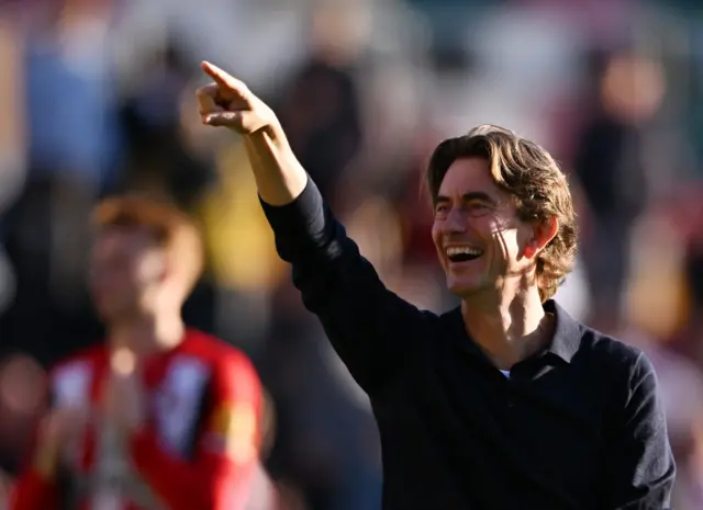 Brentford manager Thomas Frank celebrates after the match