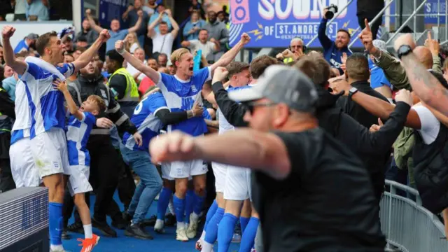 Birmingham City players and fans celebrating a goal