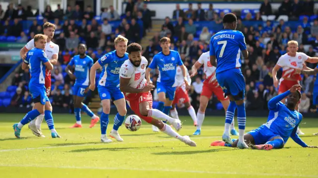 Stevenage's Jordan Roberts is denied by the Peterborough defence