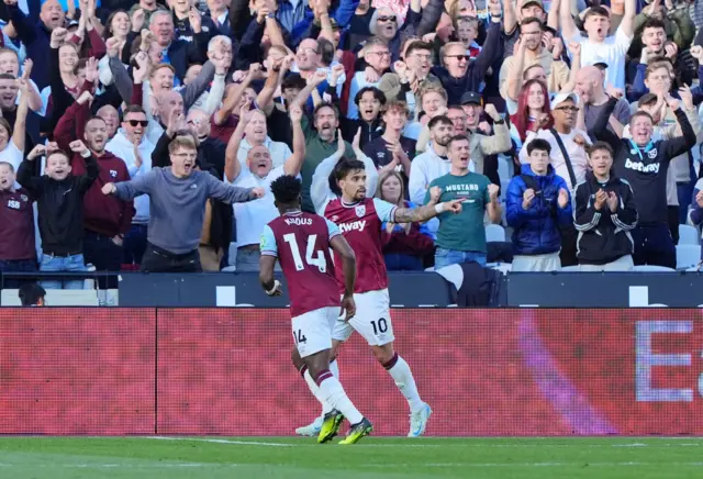 West Ham United's Lucas Paqueta celebrates scoring their side's fourth goal of the game during the Premier League match at the London Stadium.