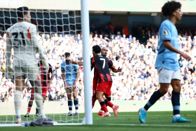 Fulham's Andreas Pereira celebrates scoring their first goal with Fulham's Raul Jimenez