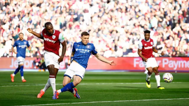 West Ham United's Michail Antonio scores their first goal Action