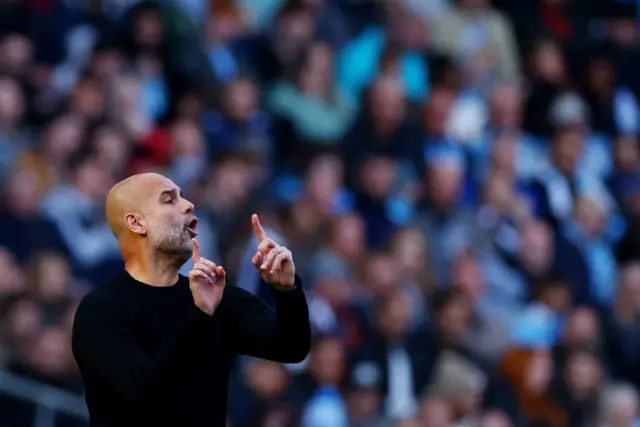 Manchester City manager Pep Guardiola reacts