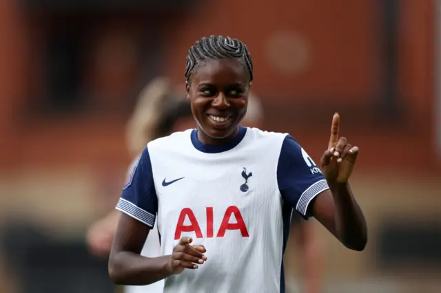 Jess Naz celebrates her goal v Palace by smiling and wagging her finger