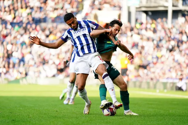 Action from West Brom v Millwall