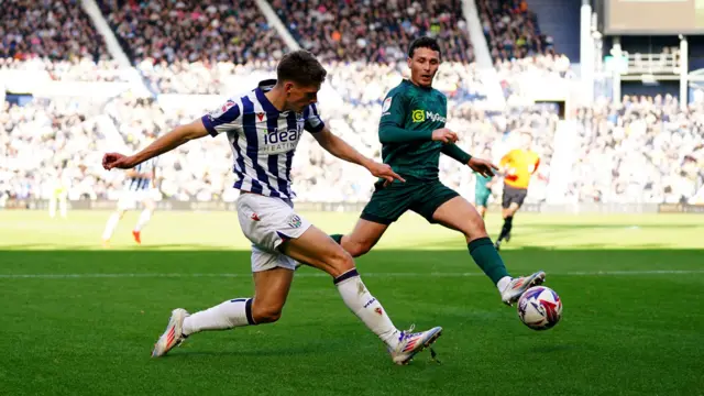 West Brom's Tom Fellows attempts a cross during the Championship match against Millwall