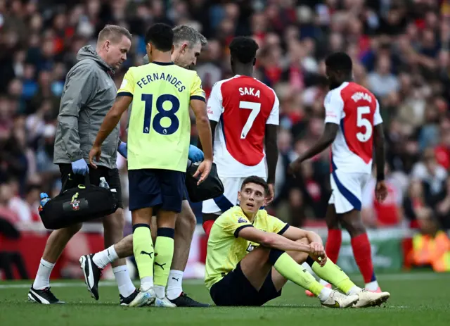 outhampton's Ross Stewart receives medical attention after sustaining an injury