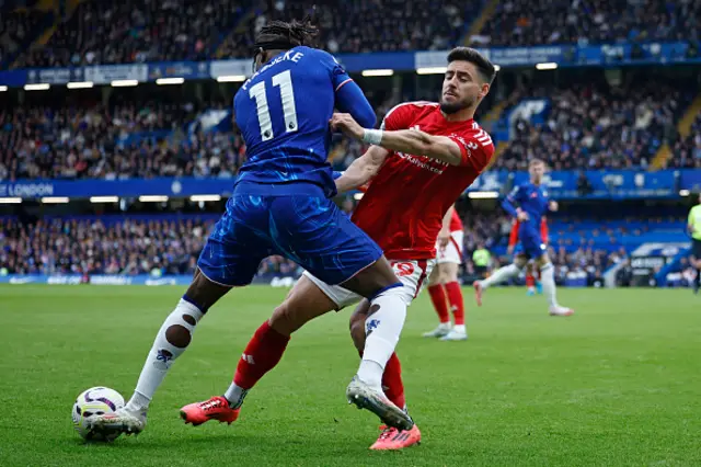 Noni Madueke and Nottingham Forest's Spanish defender Alex Moreno