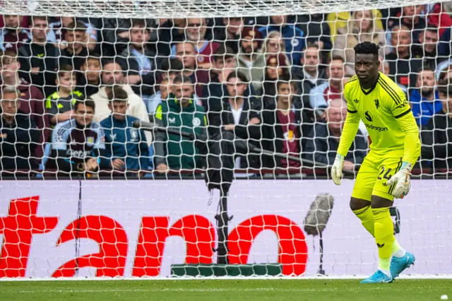 Andre Onana of Manchester United looks on