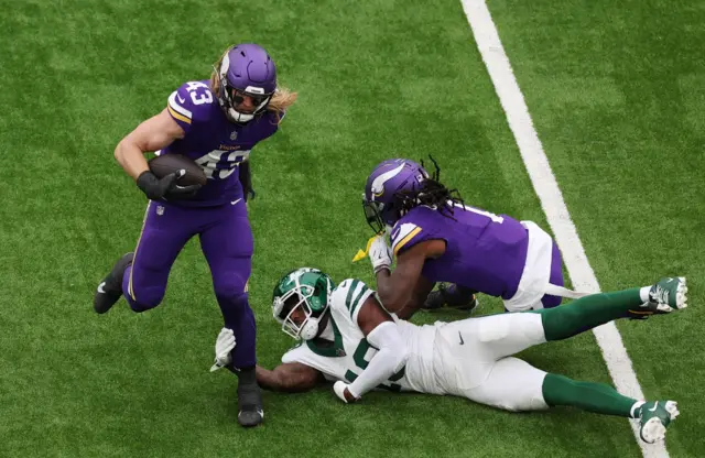 Andrew van Ginkel running with the ball for the Minnesota Vikings