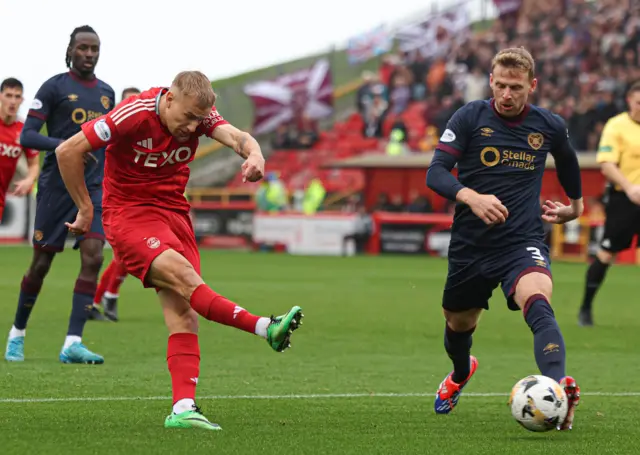 Topi Keskinen's strike evades Craig Gordon via a deflection