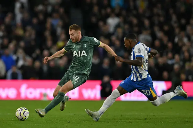 Dejan Kulusevski (L) vies with Brighton's Ecuadorian defender Pervis Estupinan