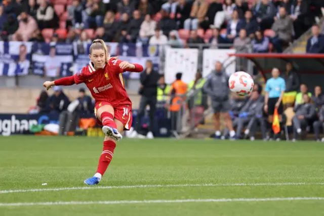 Marie Hobinger scoring a free-kick for Liverpool to put them ahead against Tottenham