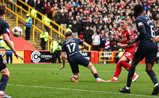 Aberdeen's Ante Palaversa scores