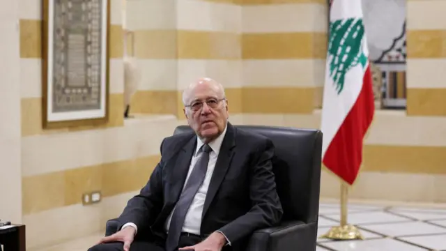 Lebanon's caretaker Prime Minister Najib Mikati looks on during a meeting with Iranian Foreign Minister Abbas Araqchi in Beirut, Lebanon, October 4, 2024