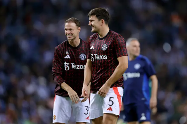 Jonny Evans of Manchester United and Harry Maguire of Manchester United look on