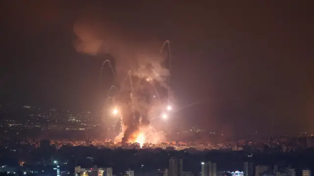 Smoke and flames rise in Beirut's southern suburbs, after Israeli air strikes, amid ongoing hostilities between Hezbollah and Israeli forces, as seen from Sin El Fil, Lebanon, October 7, 2024.