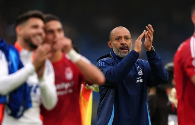 Nuno Espirito Santo applauds the fans after the final whistle