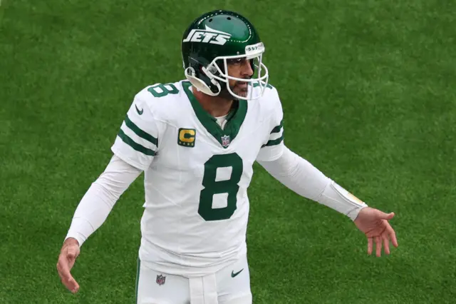 Aaron Rodgers looking frustrated during the New York Jets' game with the Minnesota Vikings in London