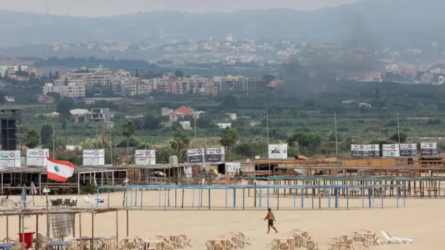 Smoke rises amid the ongoing hostilities between Hezbollah and Israeli forces, as seen from Tyre