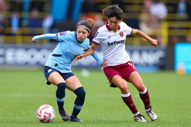 Manchester City's Rui Hasegawa battles against West Ham's Riko Ueki