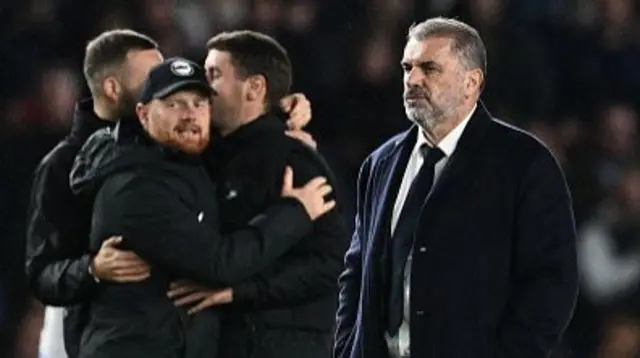 Ange Postecoglou, the manager of Tottenham Hotspur FC looks dejected