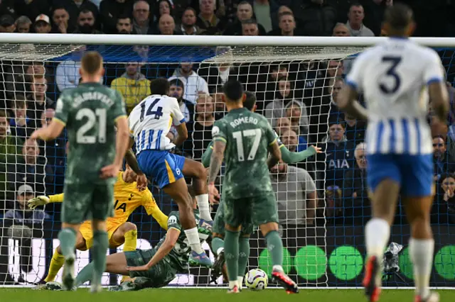 Georginio Rutter (2L) shoots to score their second goal