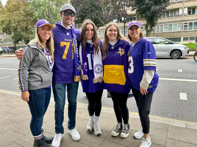 Minnesota Vikings fans pose for a picture