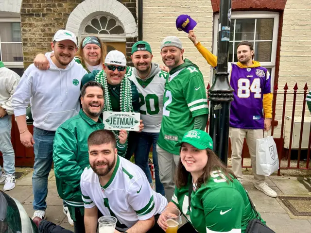 New York Jets fans pose for a picture