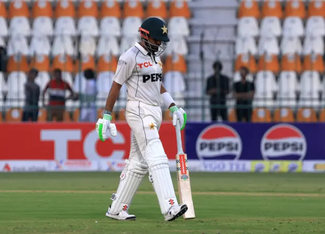 Babar Azam walks off after being dimissed