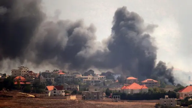 Smoke rises above the villages of Khiam and Kfar Kila, in southern Lebanon