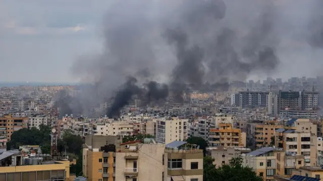 Smoke rises from overnight Israeli airstrikes on October 7, 2024 in Beirut, Lebanon.