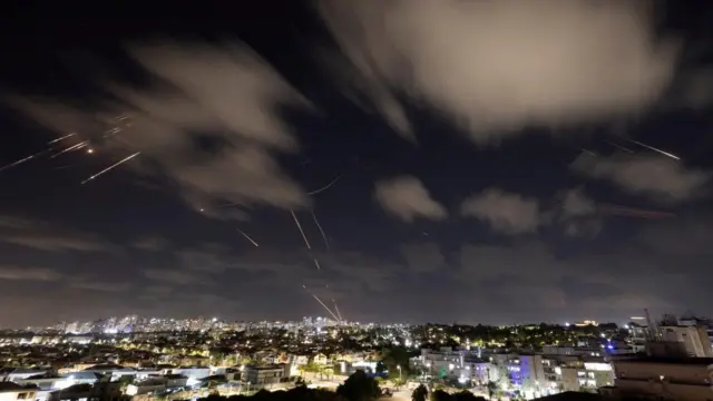 Israel's Iron Dome anti-missile system intercepts rockets after Iran fired a salvo of ballistic missiles, as seen from Ashkelon, Israe