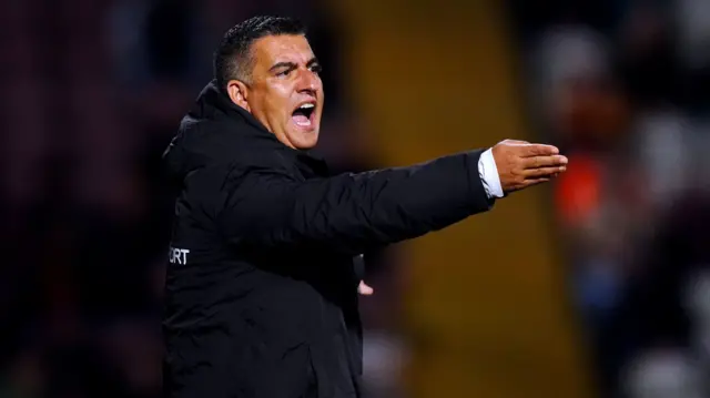 Newport manager Nelson Jardim on the sidelines at Valley Parade