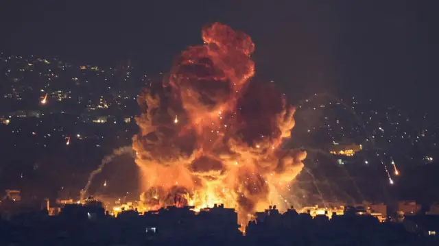 Smoke and flames rise in Beirut's southern suburbs, after Israeli air strikes, amid ongoing hostilities between Hezbollah and Israeli forces, as seen from Sin El Fil, Lebanon, October 6, 2024.