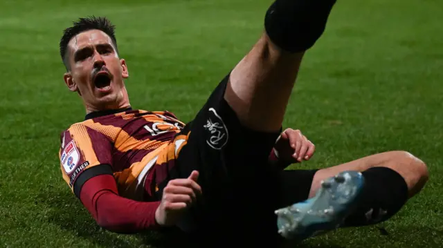 Jamie Walker celebrates his goal for Bradford against Newport