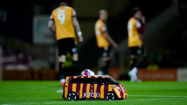 The matchball is delivered at Valley Parade