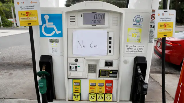 A gas station with a 'no gas' sign on one of the pumps in Florida