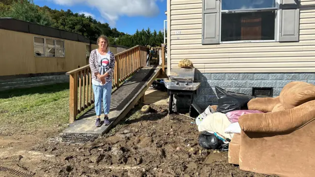 Cinda Galgano stands in front of her home in Boone, North Carolina