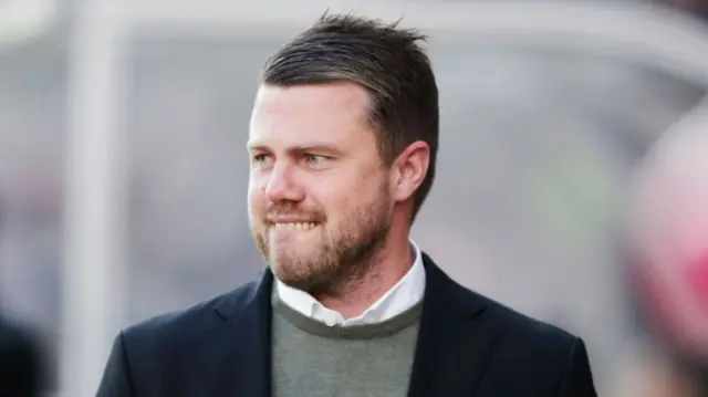 Jimmy Thelin, current manager of Aberdeen, smiling.