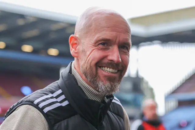 Erik ten Hag smiles at Villa Park