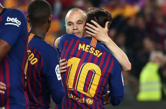 Andres Iniesta and Leo Messi