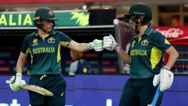 Australia openers Beth Mooney and Alyssa Healy touch gloves