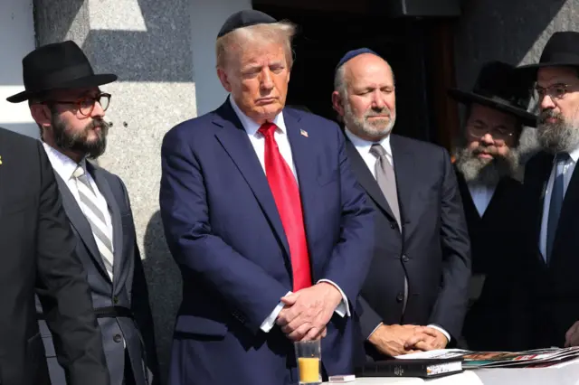 Donald Trump visits gravesite in Queens