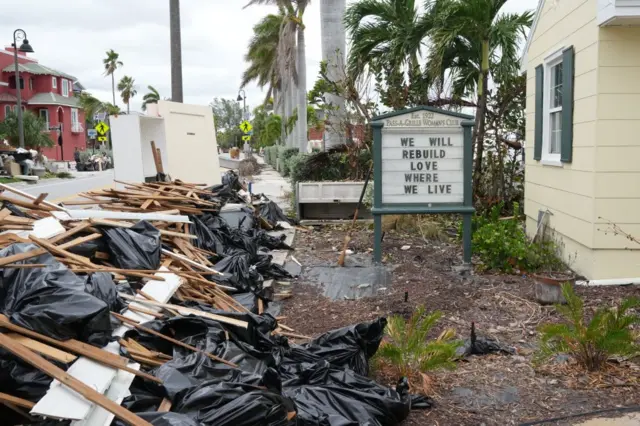 A sign is seen at the Pass-A-Grille Women's Club in St. Petersburg, Florida, ahead of Hurricane Milton's expected landfall in the middle of this week on October 7, 2024