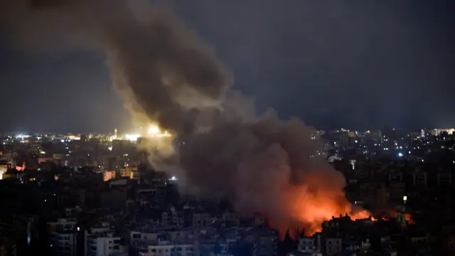 Smoke rises as a result of an Israeli airstrike at Dahieh Hadath area in the southern suburb of Beirut