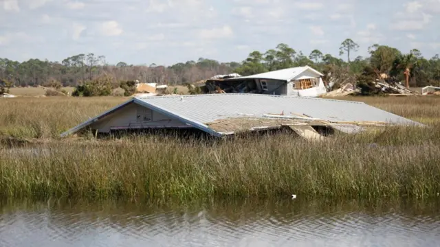 A view of homes in a marsh after they were lifted from their foundation by the storm surge from Hurricane Helene that passed through the Florida panhandle at the end of September